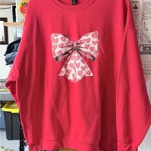 Red Sweatshirt with Heart Bow Design